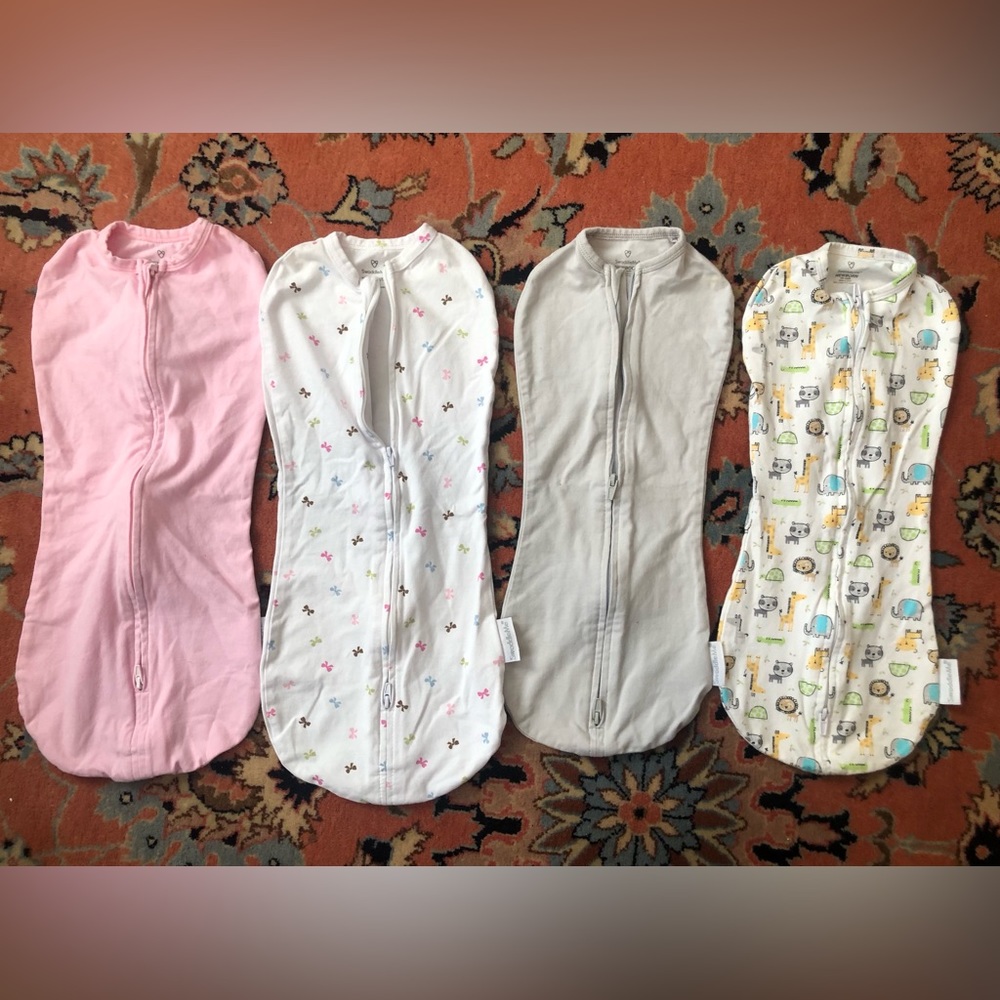 Four Newborn Zip Swaddles by Swaddle Me